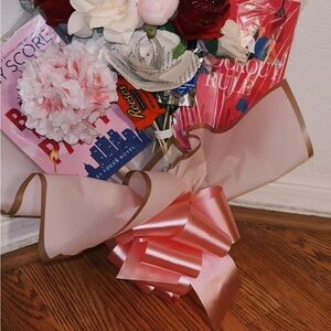 Pink and Red Floral Bouquet with Books